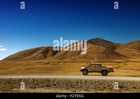 Car SUV on the mountains background Stock Photo