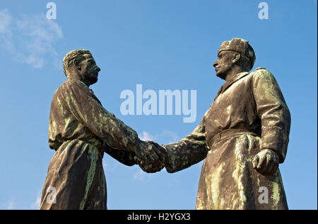 Handshake at Hungarian-Soviet Friendship Memorial by Zsigmond Kisfaludi Strobl, Statue Park, Memento Park, Szoborpark, Budapest Stock Photo