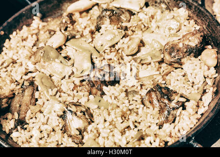 Traditional Valencian Paella With Rice And Chicken Stock Photo