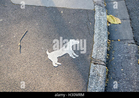 A silhouette of a dog painted on the pavement, Avenue Foch, Nancy, Meurthe-et-Moselle, Grand Est, France Stock Photo
