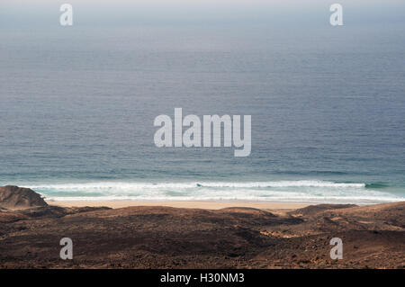 Fuerteventura, Canary Islands, North Africa, Spain: the Atlantic Ocean at the beach of Playa the Cofete, at the foot of Morro Jable mountain range Stock Photo