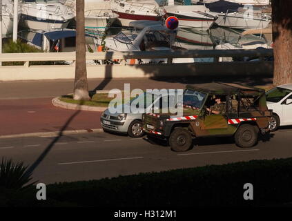 Army patrols Cote D'Azur city streets - Cannes, France. 3rd October, 2016. A French Army jeep patrols the Croisette during its daily search of the city's streets for suspicious activity. Photo: Jonathan Eastland/Ajax/Alamy Live News. Stock Photo