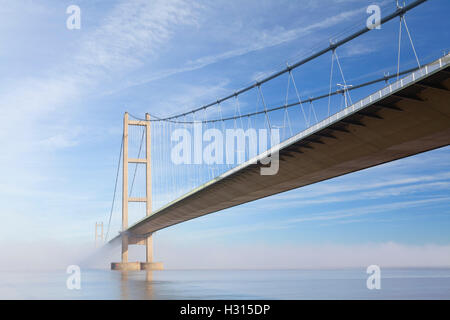 Barton-upon-Humber, North Lincolnshire, UK. 3rd October 2016. The Humber Bridge shrouded in morning mist after a night of near-freezing temperatures. Credit:  LEE BEEL/Alamy Live News Stock Photo