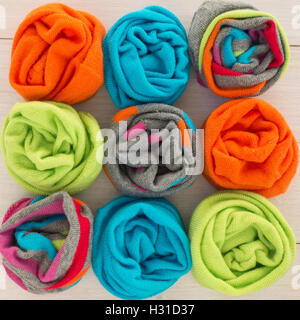 Colored socks on the wooden background Stock Photo