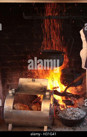 Old style cooking in fireplace Stock Photo