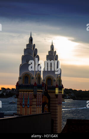 Luna Park two towers of entrance at sunset with view over Harbour Milsons Point North Shore Sydney New South Wales NSW Australia Stock Photo