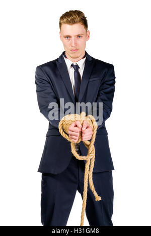 Young businessman in a suit tied up Stock Photo