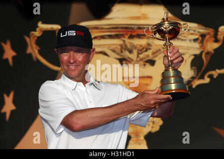 File photo dated 02-10-2016 of USA team captain Davis Love III celebrates with the Ryder Cup. Stock Photo