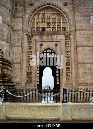 Looking through the side of the Gateway of India in Mumbai Stock Photo