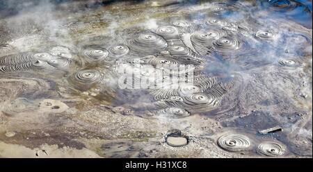 Mud pools in Rotorua, New Zealand making circular patterns Stock Photo