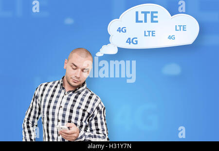 Handsome man thinking about mobile internet connection Stock Photo