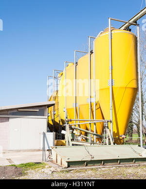 Silos for a chicken farm. Agricultural tank for the storage of feed Stock Photo