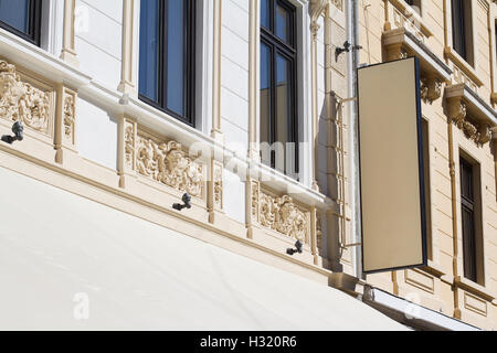 Horizontal front view of empty rectangular signage on a building with classical architecture Stock Photo