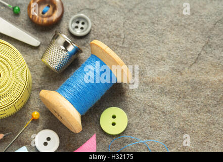 sewing tools and accessories on table background Stock Photo