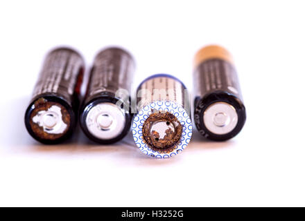 Group of used disposable drain batteries of various size ready for recycling isolated on a white background. Stock Photo