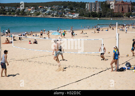 Teams playing beach volleyball on Manly Beach in Sydney,Australia Stock Photo