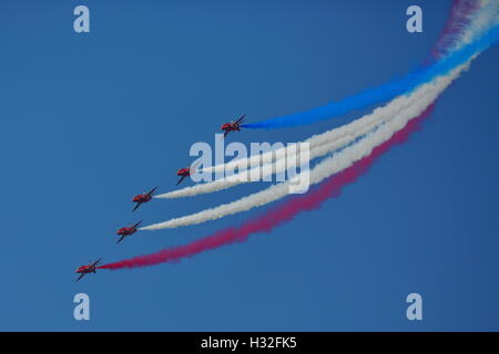 Red Arrows with their BAE Systems Hawk T.1 performing their display at Folkestone, UK Stock Photo