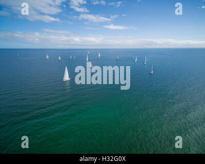 Sailboats sailing in waters of Mornington Peninsula on sunny day Stock Photo