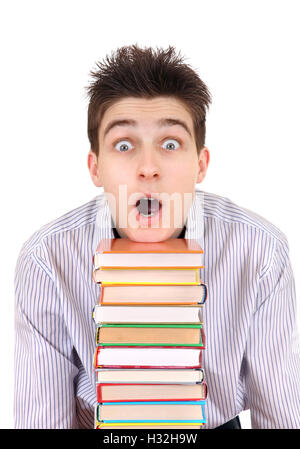Funny student with stack of books Stock Photo - Alamy