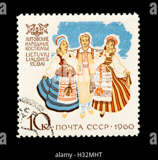 Postage stamp from the Soviet Union depicting women in various Lithuanian native costumes. Stock Photo