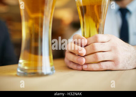 Fresh cold beer after work Stock Photo