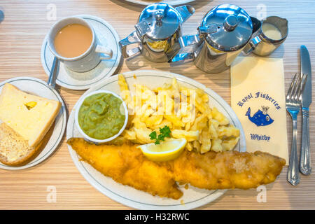 Fusco's Royal Fisheries Yorkshire Special Haddock and Chips with bread and butter mushy peas and a pot of tea Stock Photo