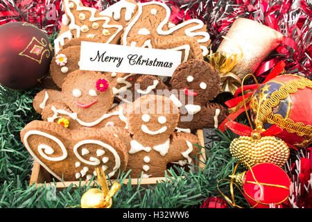 Merry Christmas Greeting Card  with Gingerbread Cookies. Stock Photo