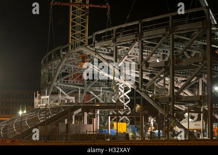 Steelwork arch installation,a significant engineering operation,Dundee,UK. Connecting both halves of the arch together. Stock Photo