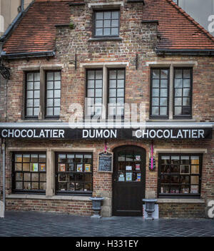 Dumon Chocolatier is a popular tourist attraction in Bruges, Belgium. It is famed for its delicious homemade chocolates. Stock Photo