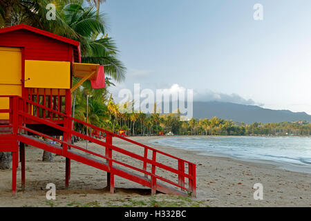 Lifeguard house, Luquillo Public Beach and El Yunque shrouded in clouds, Luquillo, Puerto Rico Stock Photo