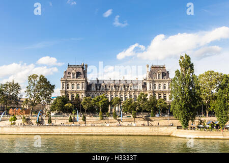 The facade of Paris city hall (hotel de ville) along the Seine river in Paris, France capital city. Stock Photo