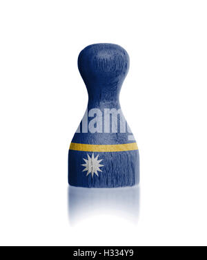 Wooden pawn with a flag painting Stock Photo