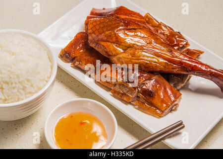 Roasted duck Chinese style, served with steamed rice Stock Photo