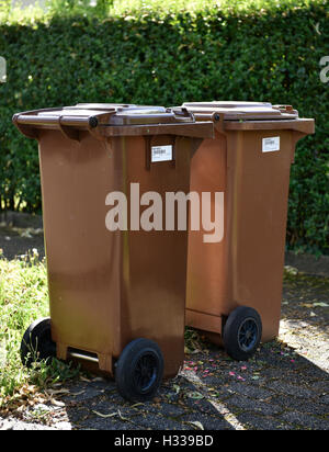 Brown garbage bins for organic waste with barcode labels, Stuttgart, Baden-Württemberg, Germany Stock Photo