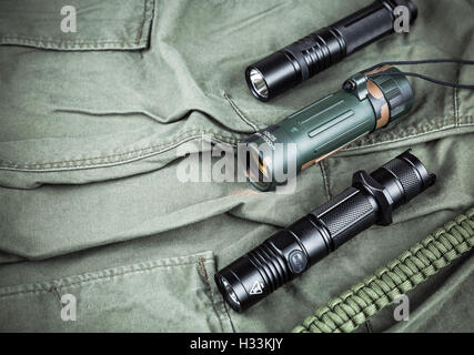 Military paracord bracelet, tactical torch and spy-glass Stock Photo