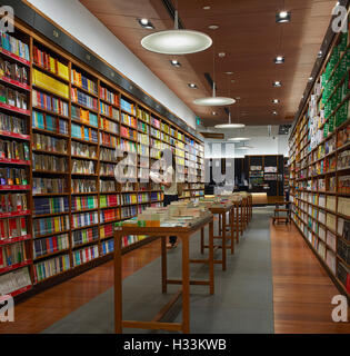 Bookshelf display. Kinokuniya EmQuartier Bangkok, Bangkok, Thailand. Architect: Kay Ngee Tan Architects, 2016. Stock Photo