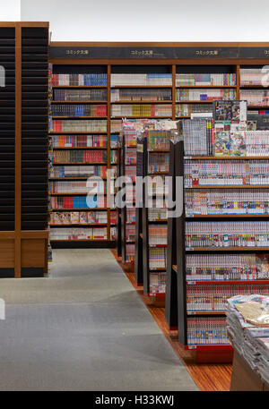 Perspective and book display. Kinokuniya EmQuartier Bangkok, Bangkok, Thailand. Architect: Kay Ngee Tan Architects, 2016. Stock Photo