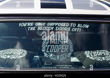 back window of a mini cooper with the famous saying " You're only