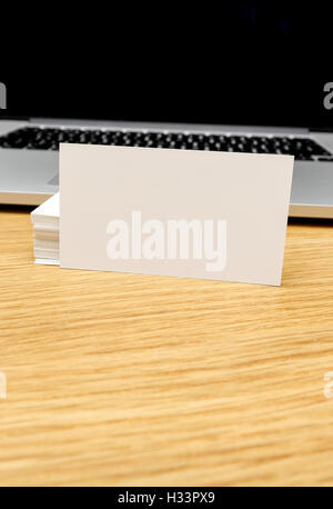 Modern desk with laptop and tablet Stock Photo