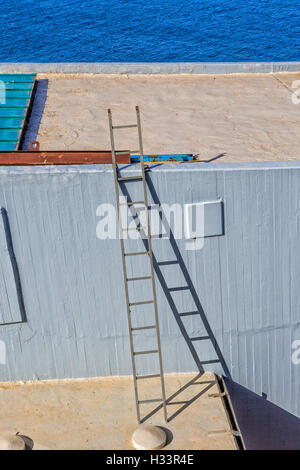 Abstraction. Stairway, shadow, building, sea. Stock Photo