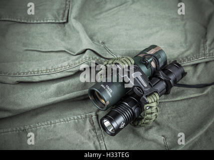 Military paracord bracelet, tactical torch and spy-glass Stock Photo - Alamy
