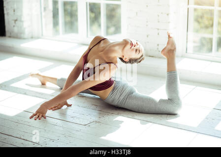 Professional female dancer taking pleasure in the workout Stock Photo