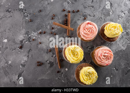 cupcakes on the grey stone background. Stock Photo