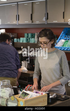 Seeds is in the main branch of the Boulder Public Library with Erika Hodges at the counter Stock Photo