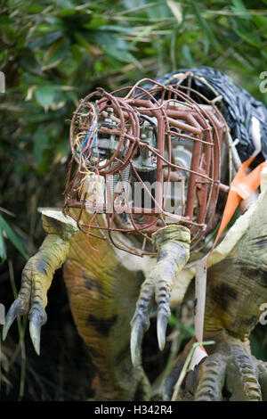 Broken mechanical dinosaur Stock Photo