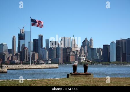 Lower Manhattan skyscrapers and Battery Park seen from Ellis Island on August 22nd, 2016 in New York City, New York. Stock Photo