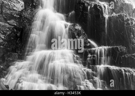 Close up detail , black and white, alow shutter speed image of part of the 39 steps waterfall,Hogsback, Eastern Cape, ZA Stock Photo