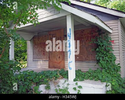 Gang graffiti and markings on an abandoned house, Detroit, Michigan, USA Stock Photo