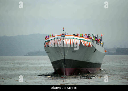 Mormugao stealth destroyer rolls into sea during its launch in Mumbai, India on September 17, 2016 Stock Photo
