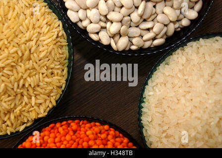 cereals and pulses. Rice, Lentils, haricot bean and barley noodles Stock Photo